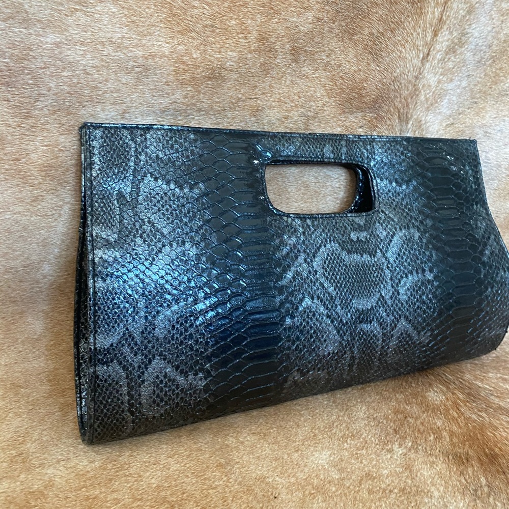 Leather snake pattern clutch